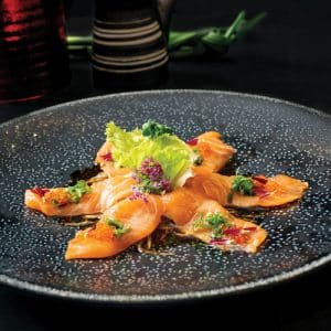 Salmon carpaccio, radish, spring onion with ponzu sauce